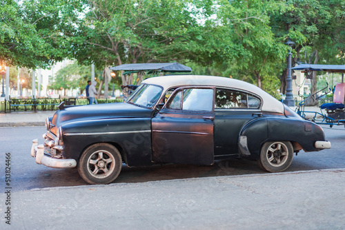 old black and white classic car in the street of havana cuba