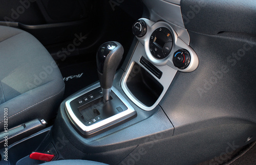 Close up of the automatic gearbox lever, black interior car. Automatic transmission gearshift stick, Closeup a manual shift of modern car gear shifter © Best Auto Photo