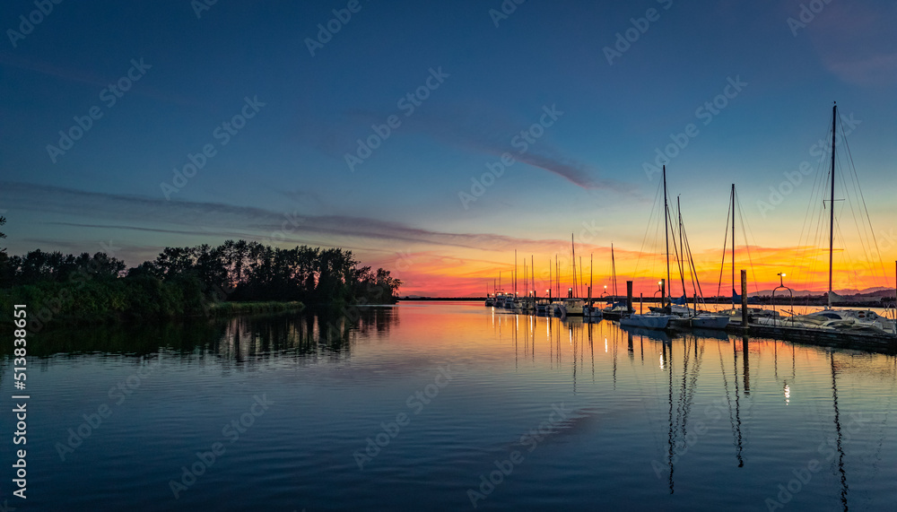 Beautiful sundown at the yacht harbor. Summer sunset at the sea. Beautiful sundown at the yacht harbor. Summer sunset at the sea.