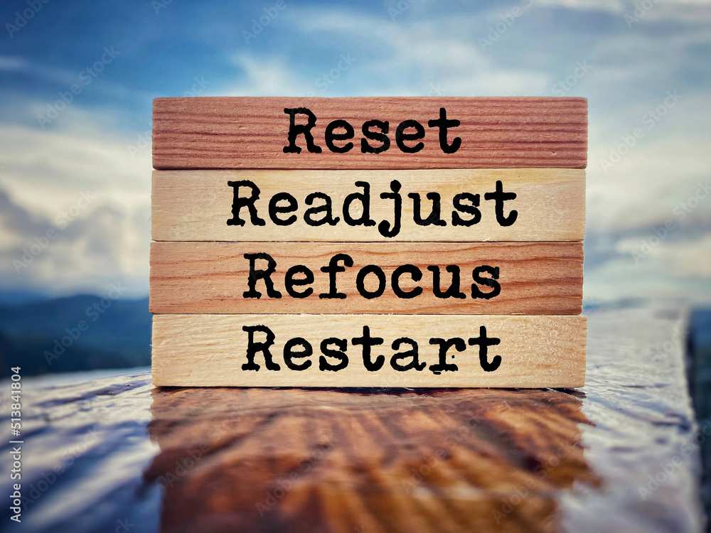 Inspirational and Motivational Concept - reset readjust refocus restart text background. Stock photo. - obrazy, fototapety, plakaty 