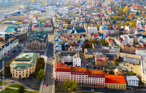 Panoramic aerial view of autumn townscape of Czech city of Liberec overlooking Neo-Renaissance building of Town Hall