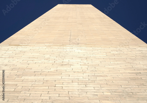 Close-up view of the Whashington monument against blue sky 
