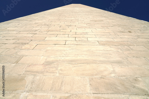 Close-up view of the Whashington monument against blue sky 