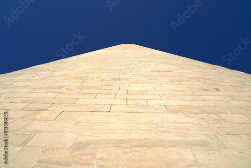 Close-up view of the Whashington monument against blue sky  photo