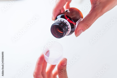 empty medicine bottle, coughing, copy space, health and wellness concept