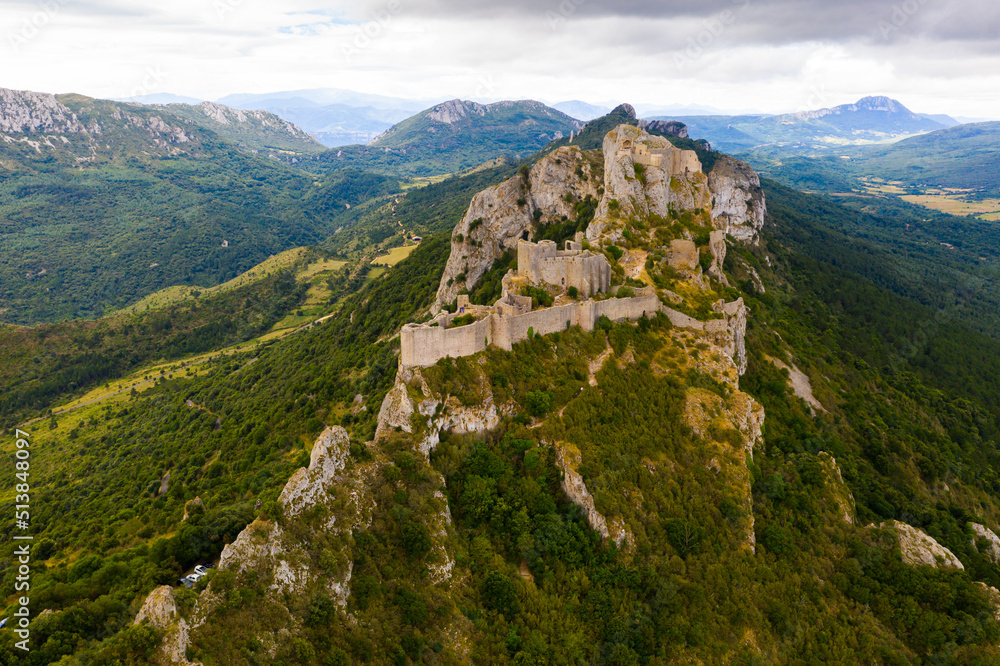 Ruins of Cathar castle of Peyrepertuse perched on rocky ridge. France