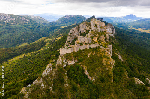 Ruins of Cathar castle of Peyrepertuse perched on rocky ridge. France