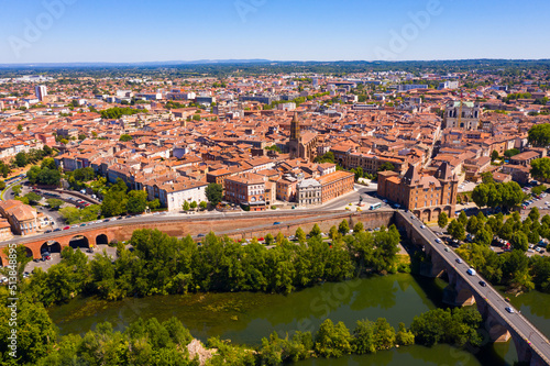 Panoramic view from drone of houses and bridges over Tarn river of french city Montauban