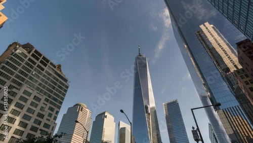 Looking Up to the One Trade Center Building and Surrounding Skyscrapers During the Day Time with No Clouds
