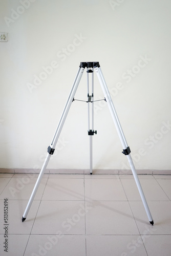 Telescope on tripod with parts. Reflector with optical tube of Newtonian system on azimuth mount. White background.