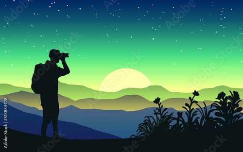 silhouette of a person in the mountains