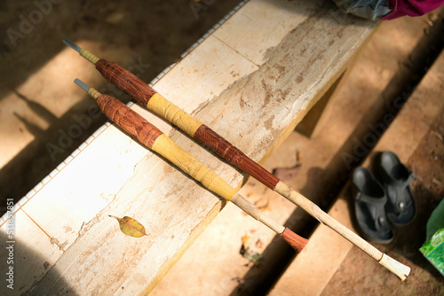 Two finished blowpipe or sumpit ready to be used or for sale photo