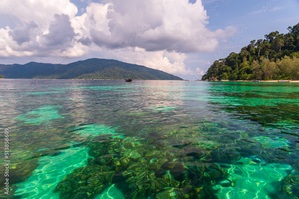 Obraz premium Beach and sea view on Lipe island, Satun Province, Thailand, andaman sea where you can watch the sunrise and sunset on the same beach.