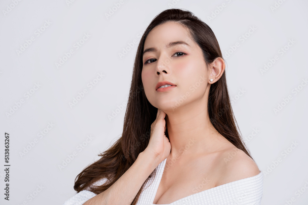 Beauty and spa, Asian women portrait with clean fresh skin . She touches her neck with her hands. Beauty and spa, Asian women portrait with clean fresh skin . She touches her neck with her hands.