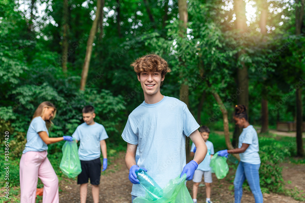 Fototapeta premium Recycle waste litter rubbish garbage trash junk clean training. Nature cleaning, volunteer ecology green concept.Environment plastic pollution.