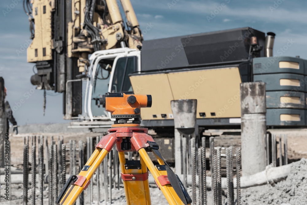 Geodetic level on the background of a drilling rig. Hydraulic drilling ...