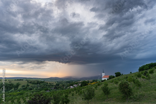 Stormy landscape with small chapel