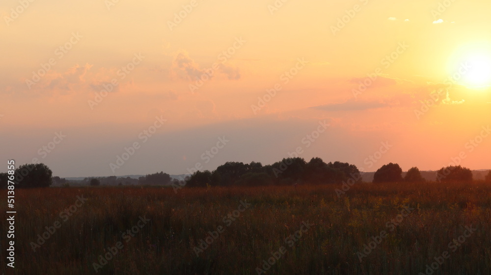 Sunset over water meadows between the Staritsa River and the village of Agro-Pustyn