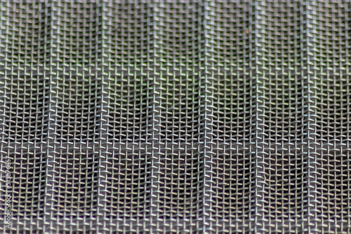Solid metal mesh over metal grid as solid filter for particles in heavy industry products for durability