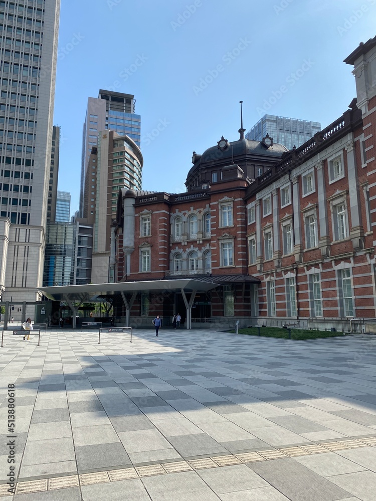 Tokyo station building and the Japanese flags, year 2022 June 19th