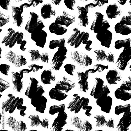 Black brush strokes seamless pattern. Abstract hand painted ornament with texture brush strokes. Black ink curly smears. Hand drawn blots with dry rough edges. Geunge freehand texture background photo