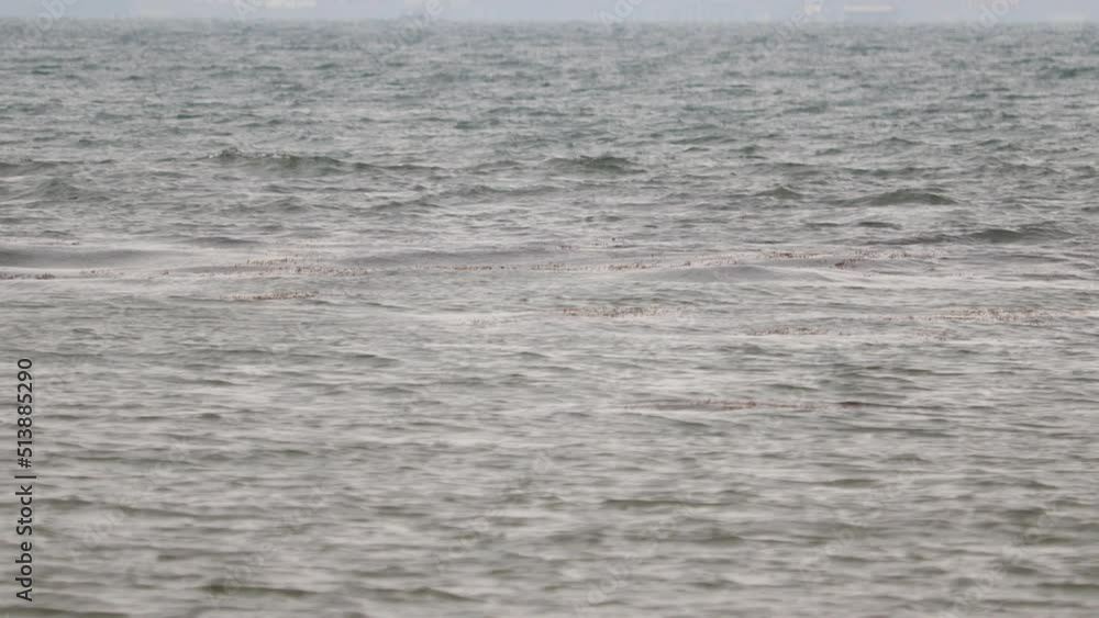 Polluted ocean water view on a daylight Polluted ocean water view on a daylight