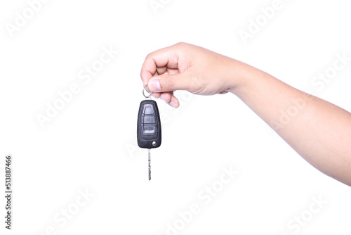 man holding car remote control and white background.