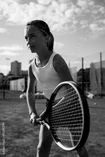 Close up portrait of a young tennis player girl © Dulin