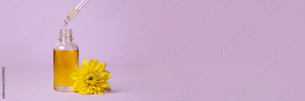 Banner front view of amber colored essential oil bottle. Banner front view of amber colored essential oil bottle.