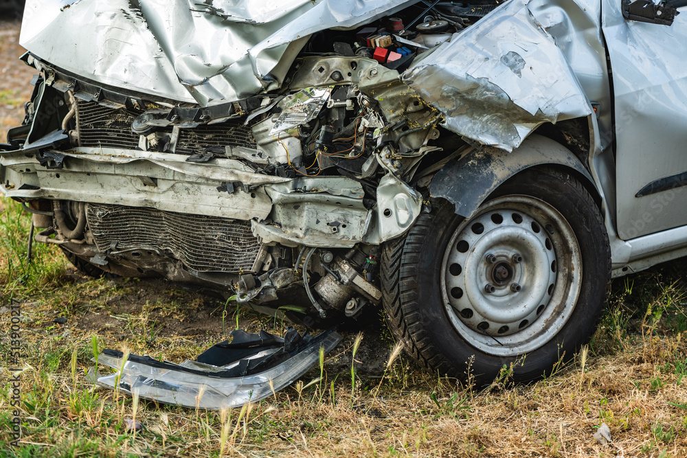Crushed and damaged car after traffic accident Crushed and damaged car after traffic accident