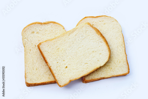Sliced of bread on white background.