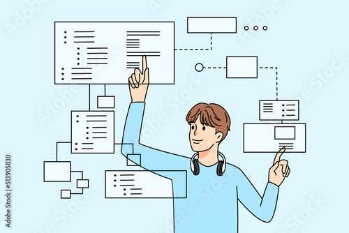 Male programmer working with tabs