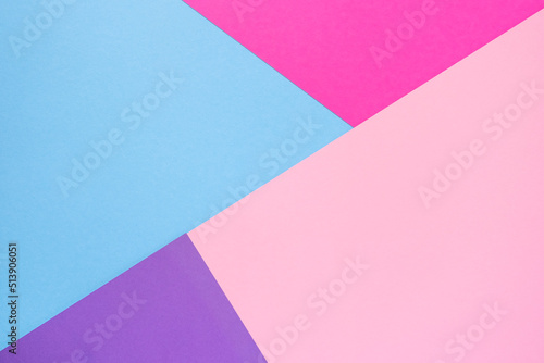 Multicolor abstract flat lay composition. Pink, purple, violet and light blue paper background. Geometric figures, shapes, lines. Copy space, top view. Back to school concept.