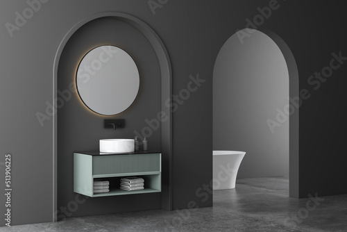  Stylish bathroom with gray and dark walls  concrete floor  comfortable bathtub and white sink with mirror. Minimalist design of modern dark bathroom. 3d rendering 