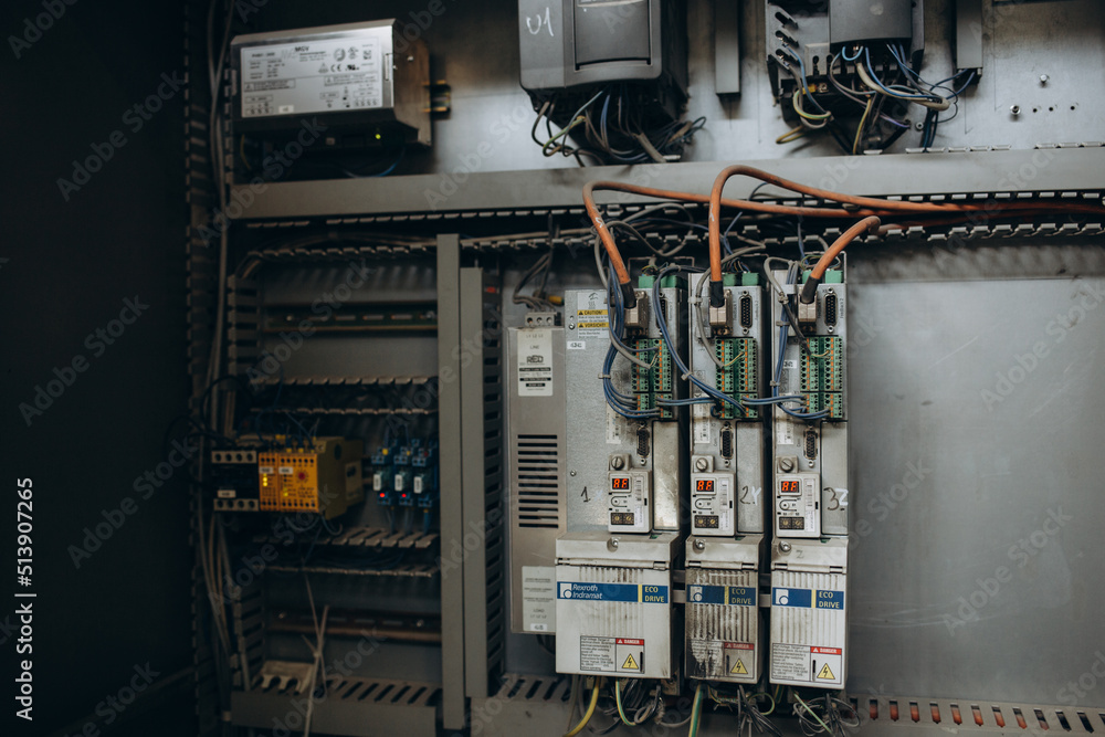 Electrical engineer using digital multi-meter measuring equipment to checking electric current voltage at circuit breaker and cable wiring system in main power distribution board. Electrical engineer using digital multi-meter measuring equipment to checking electric current voltage at circuit breaker and cable wiring system in main power distribution board.