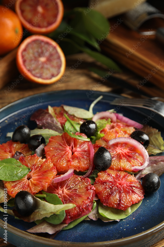 Plate of delicious sicilian orange salad on table, closeup. Space for text