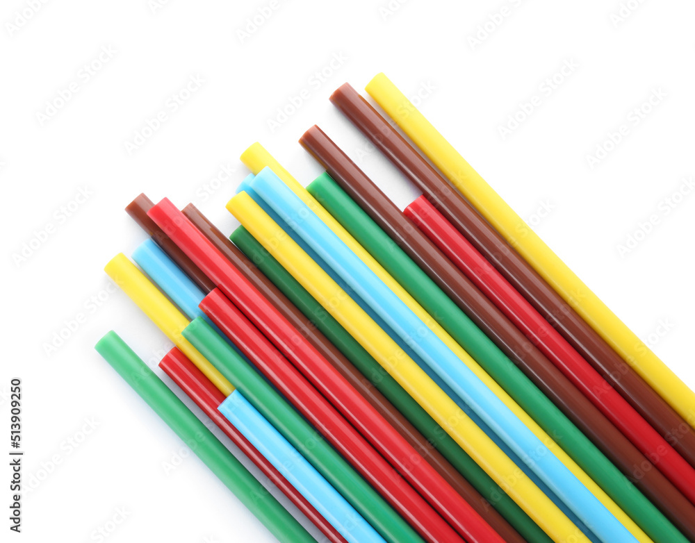 Many colorful glue sticks on white background, top view Many colorful glue sticks on white background, top view