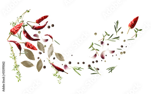 Fototapeta Naklejka Na Ścianę i Meble -  Many different spices flying on white background