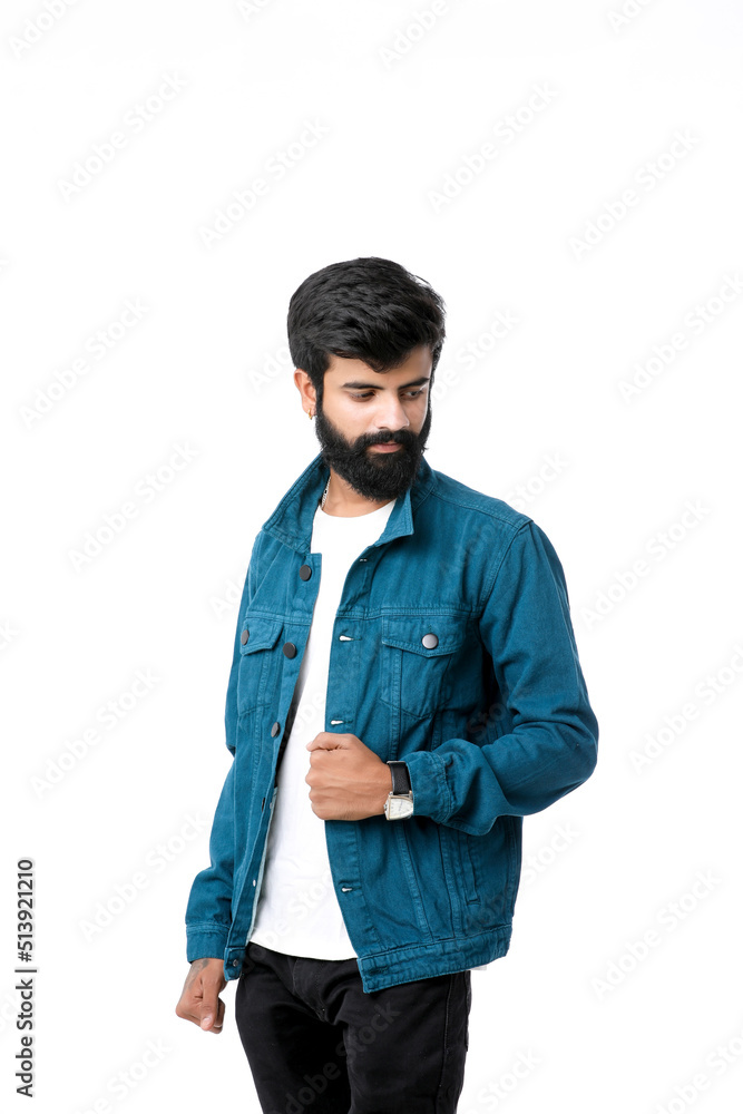 Young indian man wear jacket and giving expression over white background. Young indian man wear jacket and giving expression over white background.