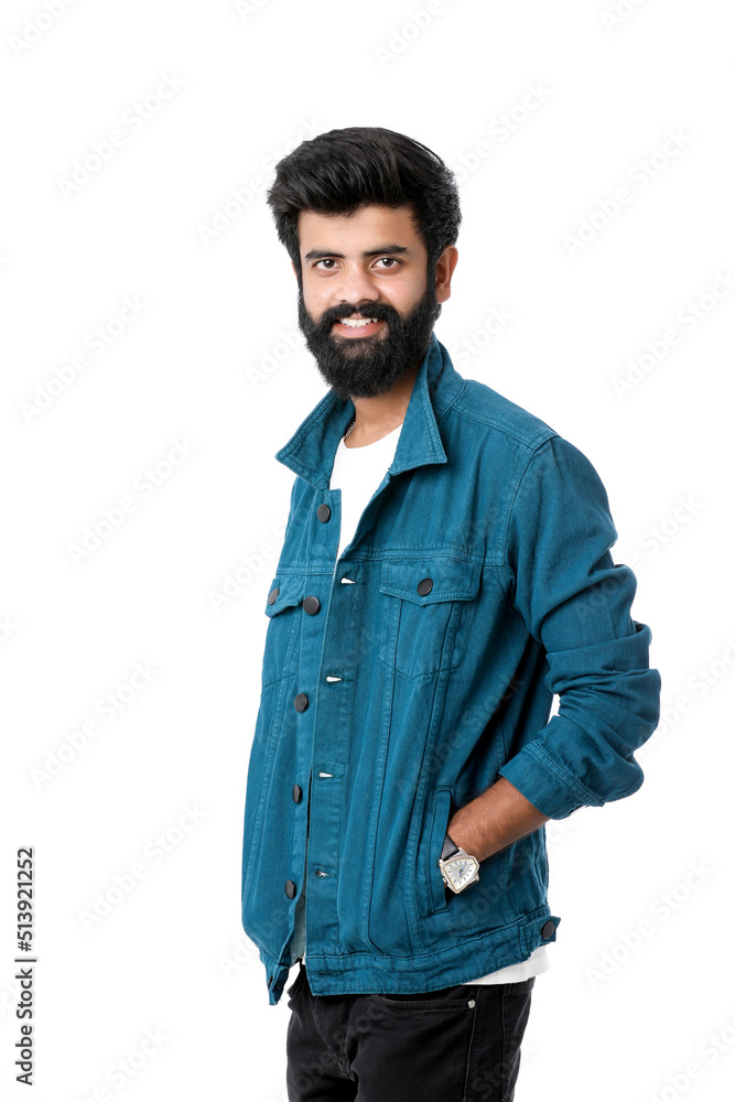 Fototapeta premium Young indian man giving expression over white background.