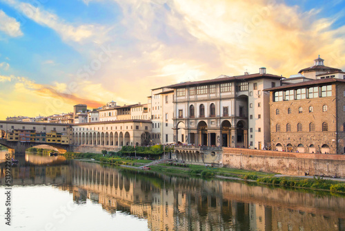 Beautiful view of the Uffizi Gallery on the banks of the Arno River in Florence, Italy photo