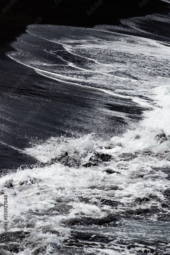 abstract wall art of black sand and sea waves