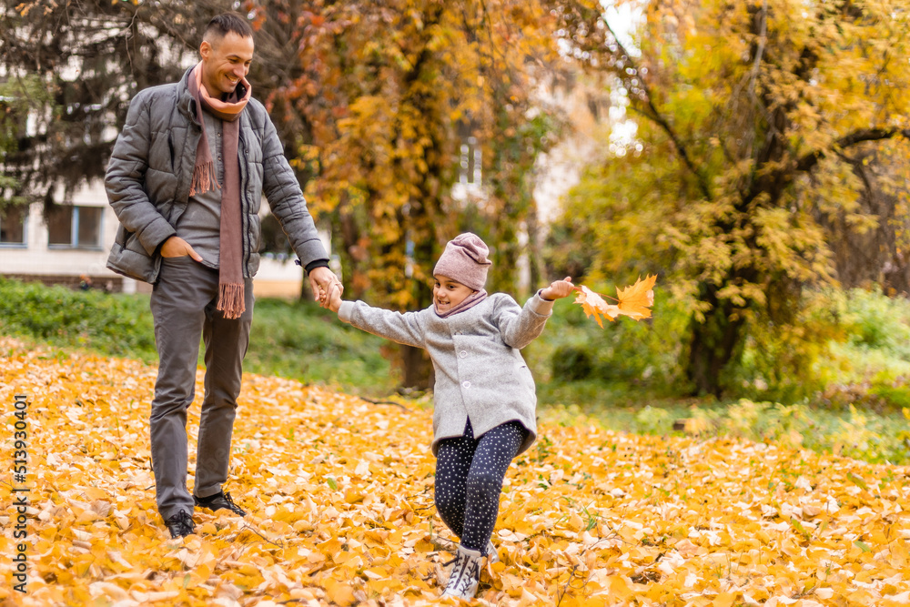 Happy father with daughter in fall season Happy father with daughter in fall season