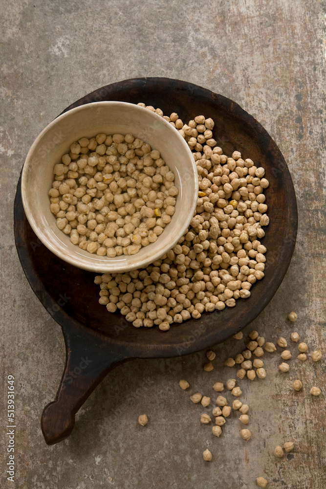 Chickpeas dry and soaking in water Chickpeas dry and soaking in water