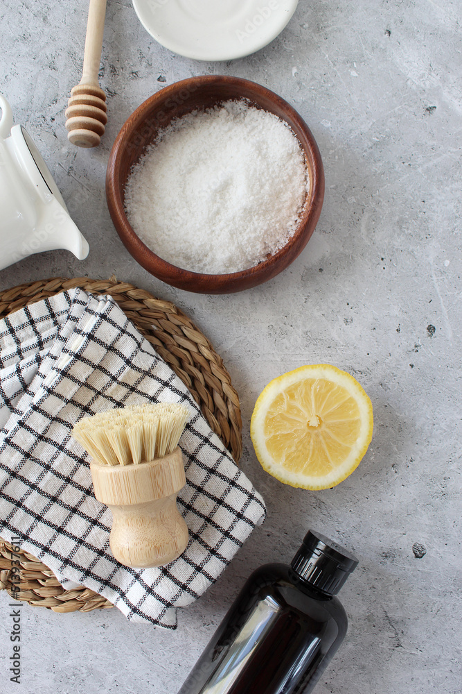 Home cleaning non toxic, natural products. Plastic free, zero waste lifestyle. Cleaning tools layout vs backing soda, lemon, mustard powder and bamboo brushes Home cleaning non toxic, natural products. Plastic free, zero waste lifestyle. Cleaning tools layout vs backing soda, lemon, mustard powder and bamboo brushes