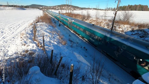 Bergen to Oslo train near Honefoss, Norway in Winter