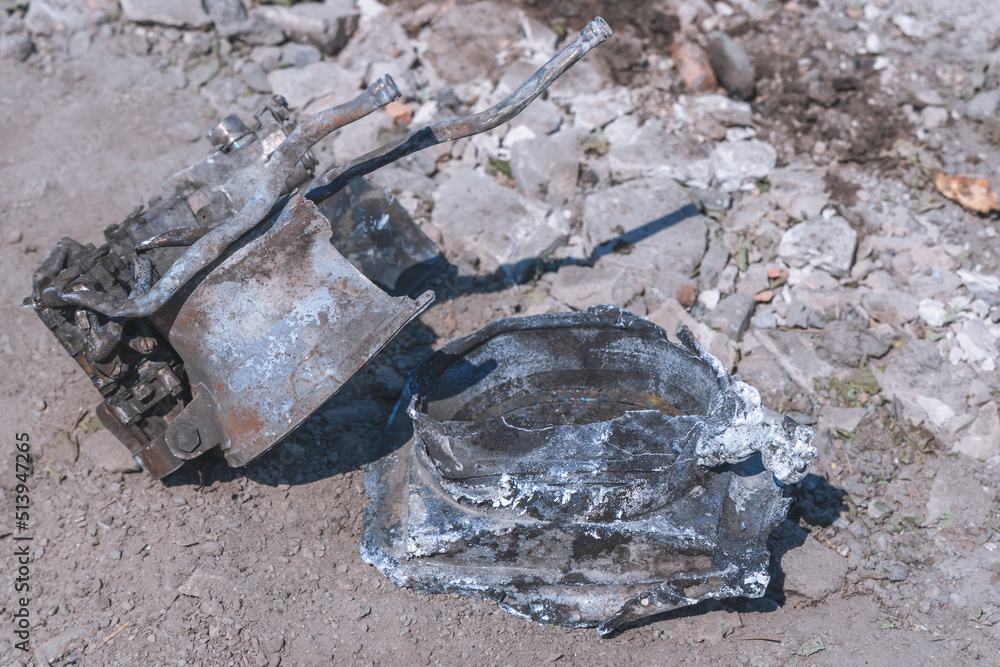 Fototapeta premium Fragment of a Russian missile after hitting a building. Shards of metal. Russian invasion of Ukraine in the city of Dnipro.