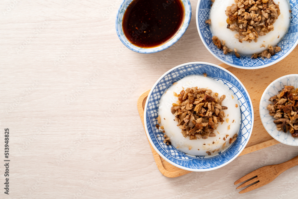 Taiwanese savory rice pudding Wa gui with chopped dried radish and soy sauce Taiwanese savory rice pudding Wa gui with chopped dried radish and soy sauce
