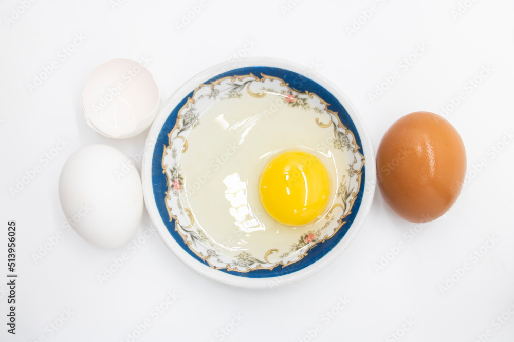 whole eggs and broken isolated on white background whole eggs and broken isolated on white background