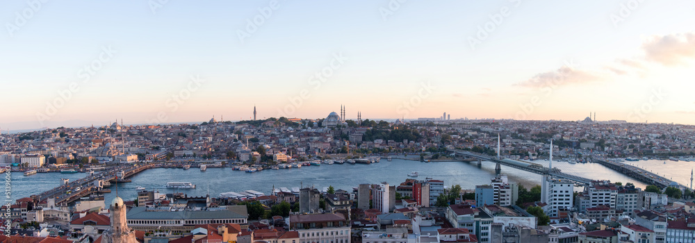 Sunset time in Istanbul. Panoramic view from Galata tower to Golden Horn, Turkey.